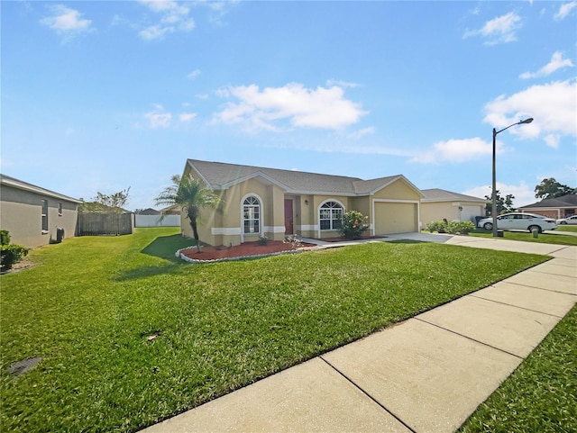 single story home featuring a front lawn and a garage