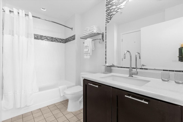 full bathroom with vanity, tile patterned flooring, toilet, and shower / bathtub combination with curtain