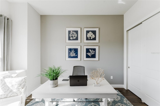 office space featuring dark wood-type flooring