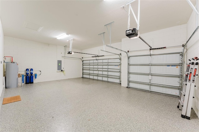 garage featuring a garage door opener, electric water heater, and electric panel