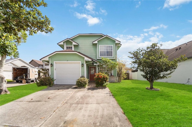 view of front of property with a front lawn and a garage