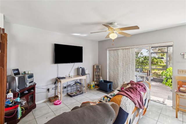 living room with ceiling fan and light tile patterned floors