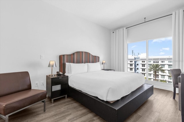 bedroom with wood-type flooring