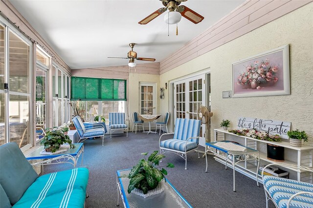 sunroom / solarium with vaulted ceiling and ceiling fan