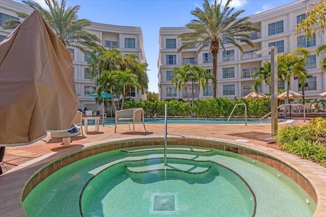 view of swimming pool featuring a patio area