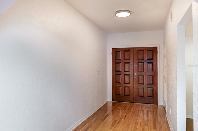 doorway featuring light wood-type flooring