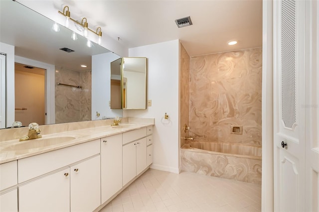 bathroom with vanity, bathing tub / shower combination, and tile patterned floors