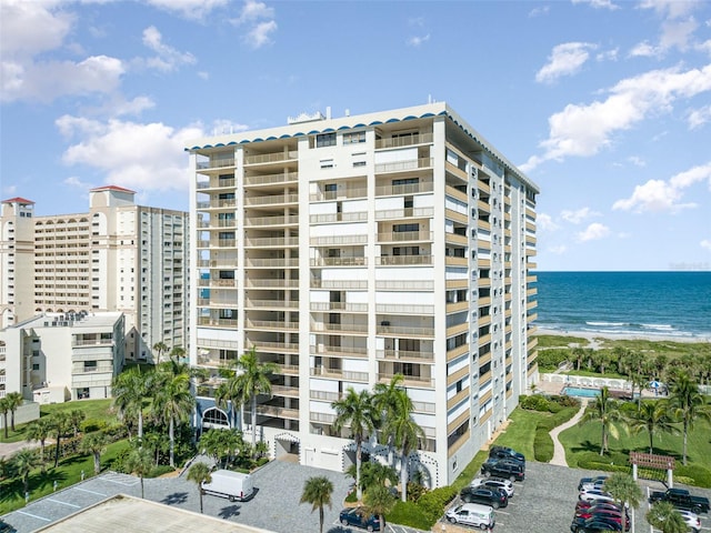 view of building exterior featuring a water view