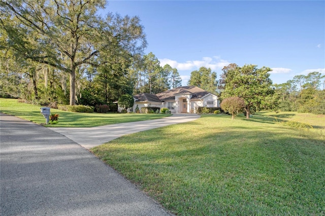 view of front of property with a front lawn