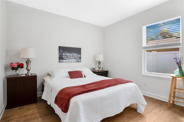 bedroom featuring dark hardwood / wood-style floors