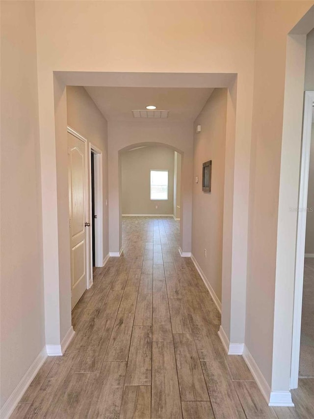 hallway featuring light hardwood / wood-style flooring