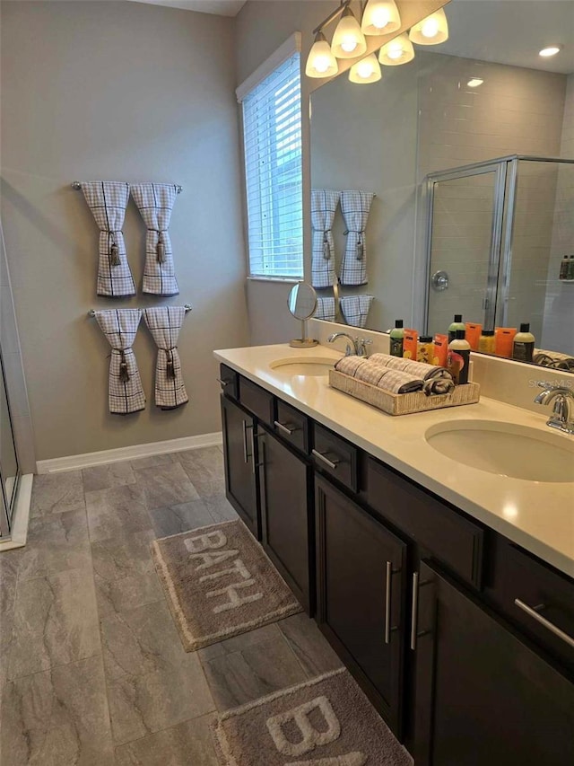 bathroom with vanity and walk in shower