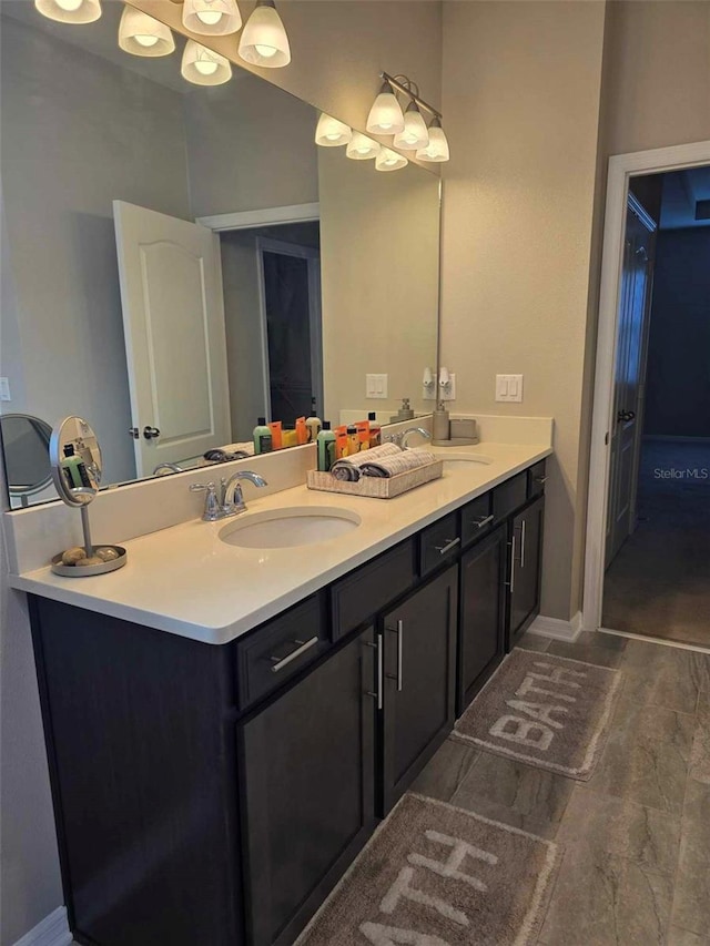 bathroom with hardwood / wood-style flooring and vanity