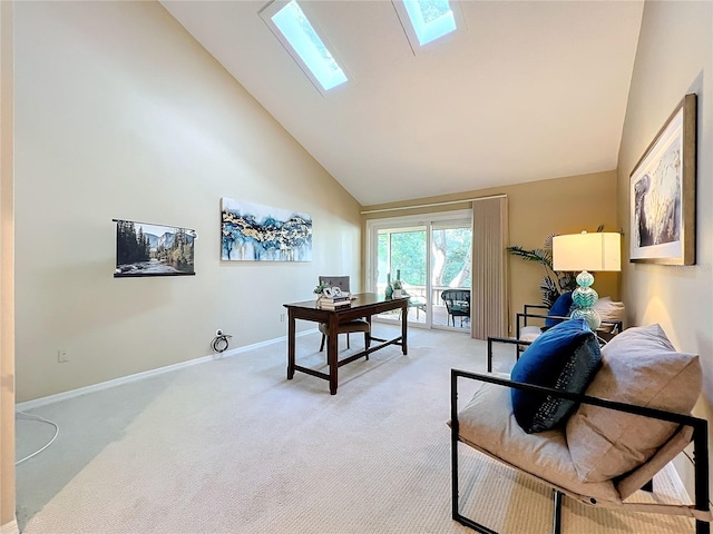 office with high vaulted ceiling, a skylight, and light colored carpet