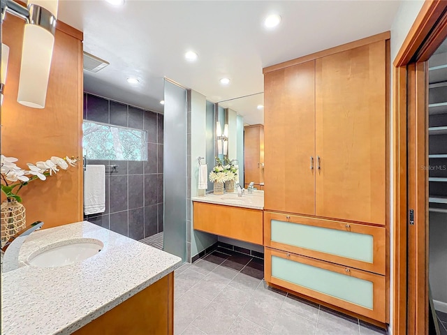 bathroom featuring vanity and walk in shower