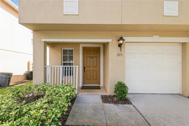 property entrance with a garage