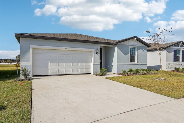 single story home with a front yard and a garage