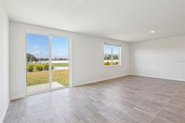 view of tiled spare room