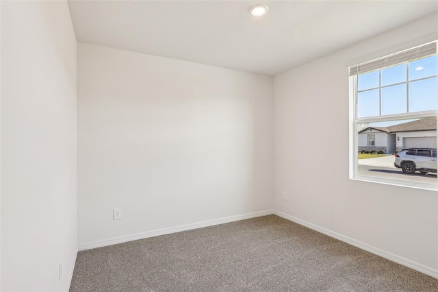 view of carpeted spare room