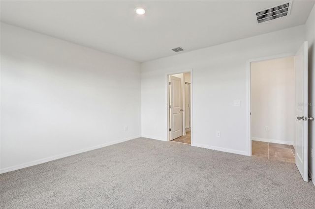 view of carpeted spare room