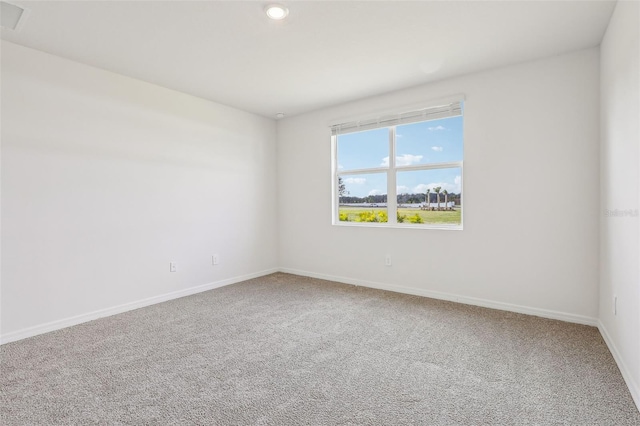 view of carpeted spare room