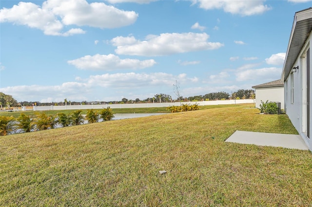 view of yard with a water view