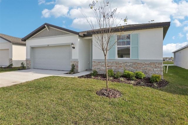 view of front facade with a garage and a front lawn