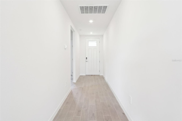 hallway featuring light wood-type flooring