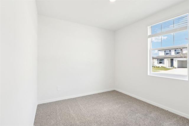 empty room with carpet floors