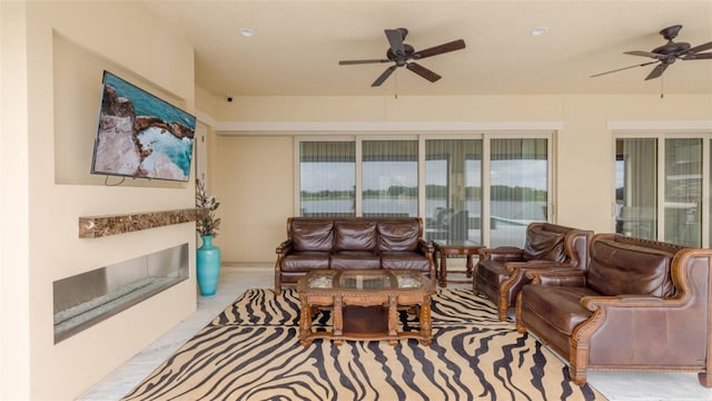 living room with ceiling fan