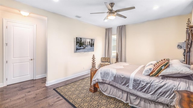 bedroom featuring dark wood-type flooring and ceiling fan