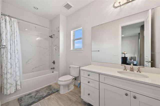 full bathroom with vanity, toilet, and shower / bathtub combination with curtain