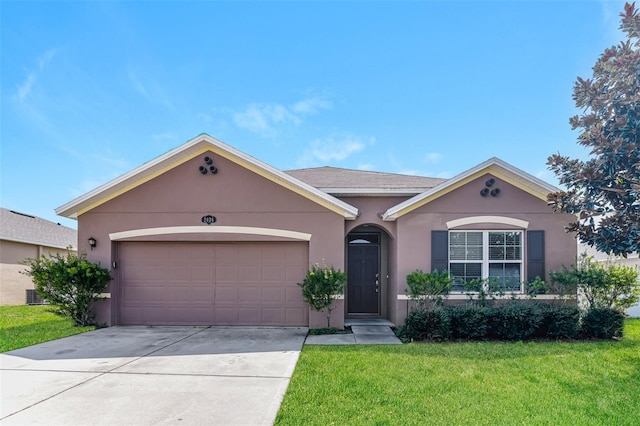 ranch-style home featuring a front yard and a garage