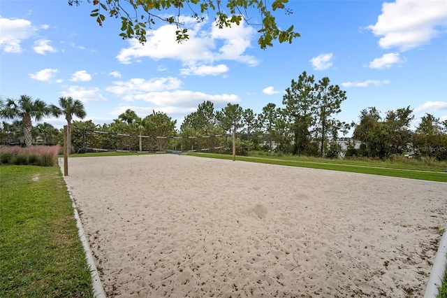 view of community featuring a yard and volleyball court