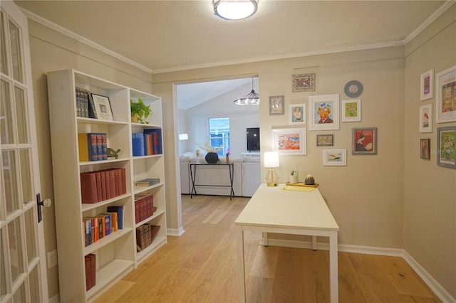 hall featuring vaulted ceiling and light wood-type flooring