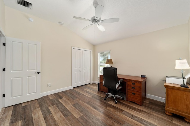 home office featuring lofted ceiling, dark wood-type flooring, and ceiling fan