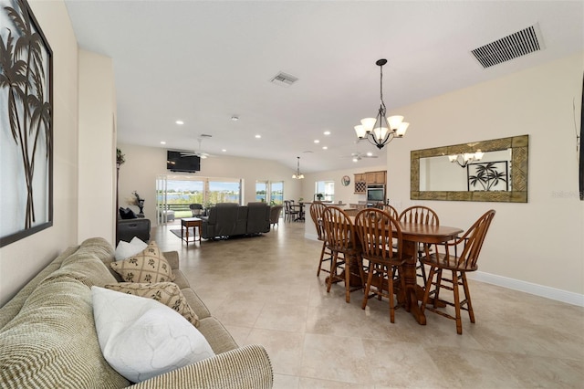 dining room featuring an inviting chandelier and light tile patterned floors