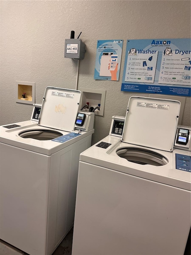 laundry room featuring washer and clothes dryer