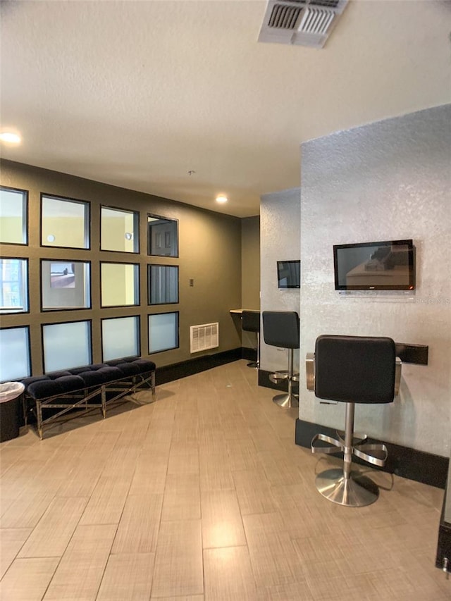 office space with light hardwood / wood-style flooring