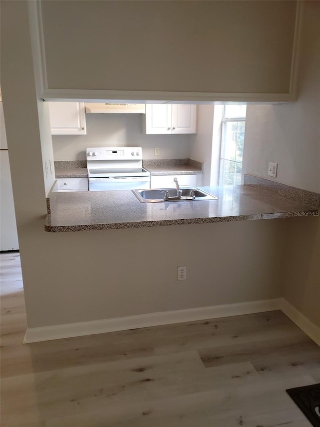 kitchen featuring sink, white cabinets, white range with electric stovetop, and light hardwood / wood-style flooring