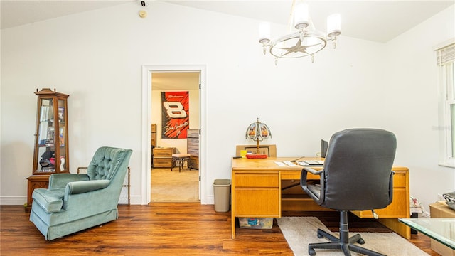 office space featuring lofted ceiling, dark hardwood / wood-style floors, and an inviting chandelier