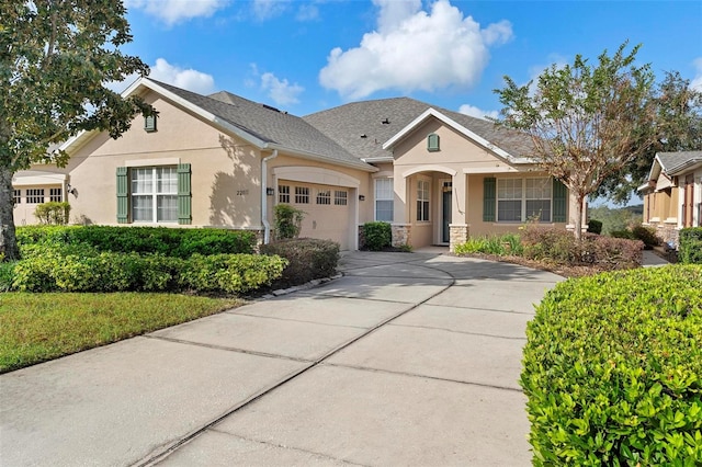 view of front of property with a garage