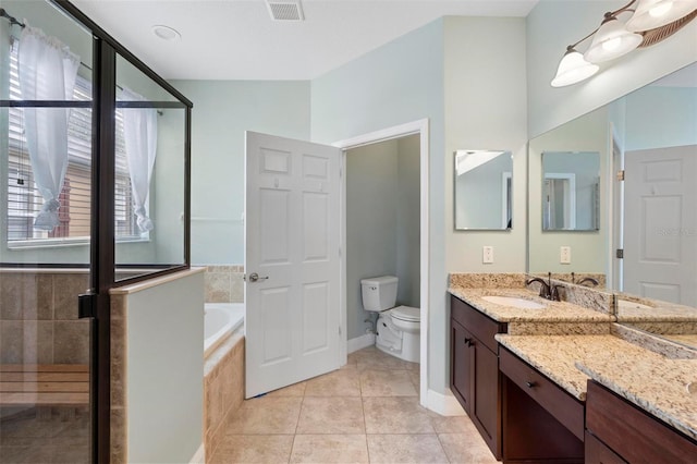 full bathroom with vanity, independent shower and bath, toilet, and tile patterned flooring