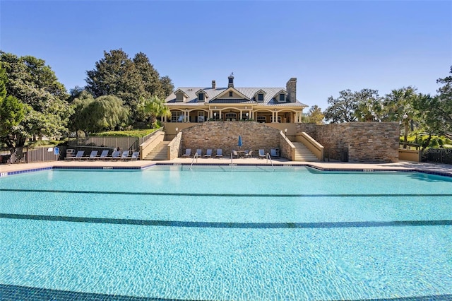 view of pool featuring a patio