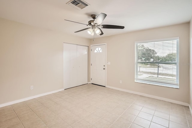 6445 Skyline Ct, Spring Hill, FL 34606 - foyer entrance featuring a ceiling fan and baseboards