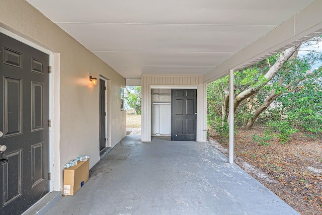 6445 Skyline Ct, Spring Hill, FL 34606 - view of patio / terrace with a carport