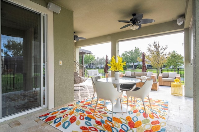 view of patio / terrace featuring an outdoor living space and ceiling fan