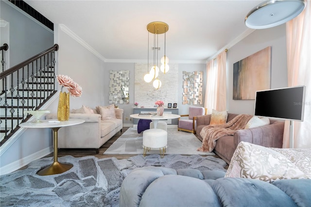 living room featuring hardwood / wood-style flooring and ornamental molding