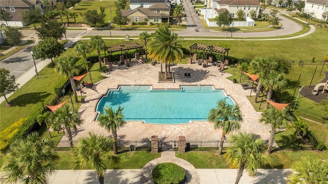 view of swimming pool featuring a patio area