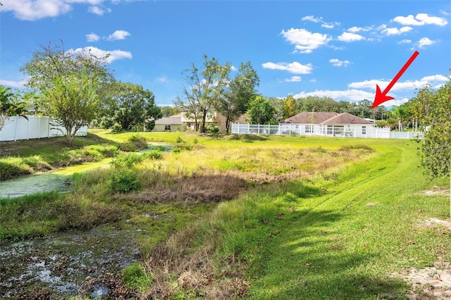 view of yard with fence